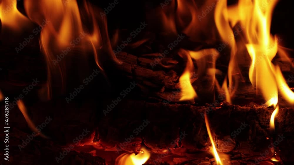 Firewood burning in the stove Firewood burning in the stove