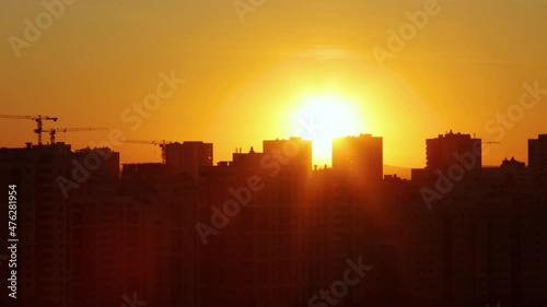 Golden sunset over a sity photo