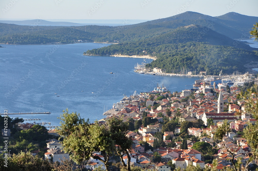 Panoramic view to the city and port of Mali Losinj. Island Losinj blue lagoon. Adriatic Sea.Buildings and houses.