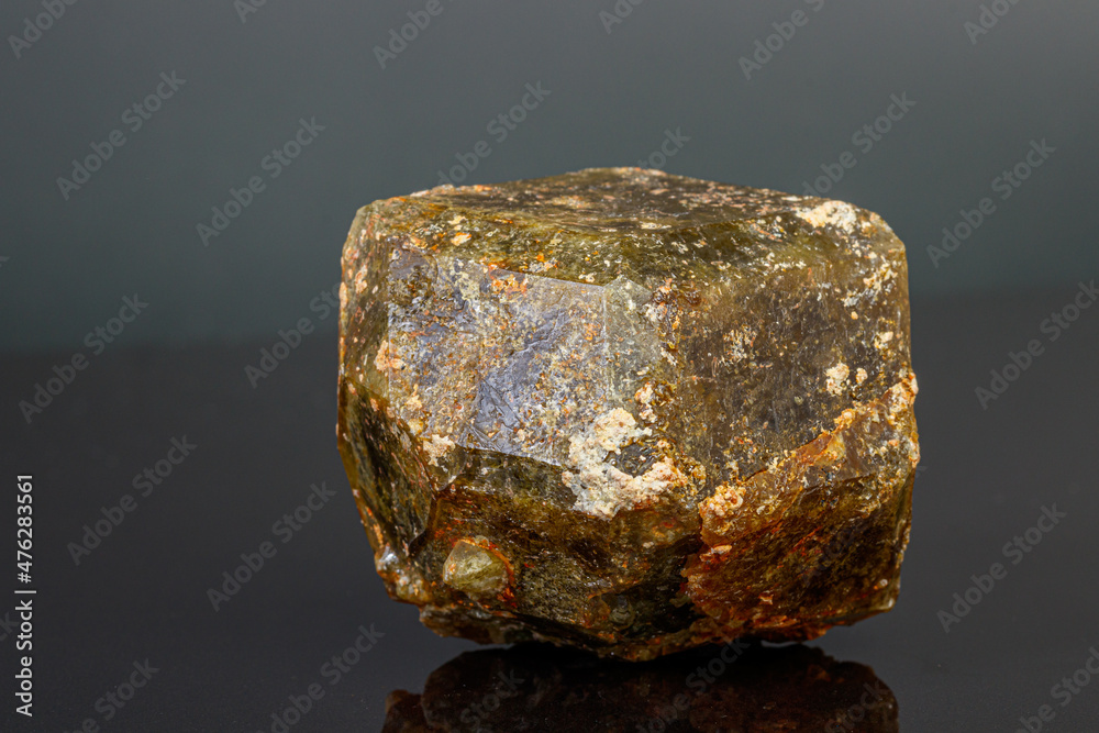 macro mineral stone Andradite on a black background macro mineral stone Andradite on a black background