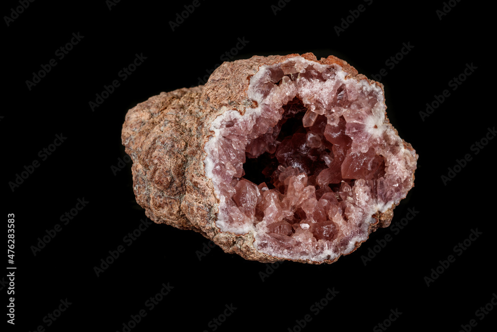 Macro mineral stone Pink Amethyst on a black background Macro mineral stone Pink Amethyst on a black background