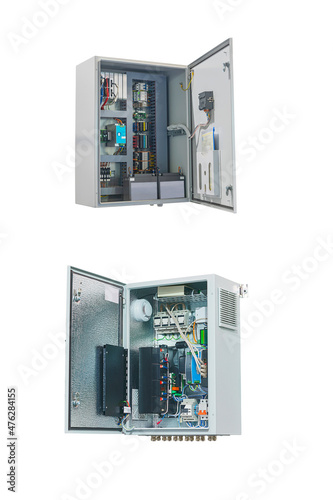 two electrical control cabinets for various purposes with an open door isolated on white background