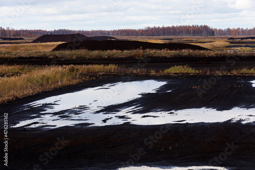 territory for peat extraction in the autumn season photo