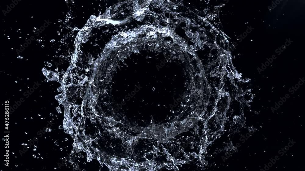 Super Slow Motion Shot of Rotating Water Ring Moving Towards Camera at 1000fps.