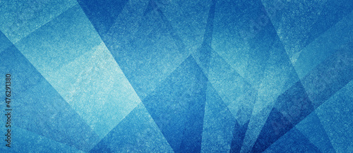 Abstract modern background in blue and white contemporary triangle and polygonal shapes layered in textured geometric art pattern with angles