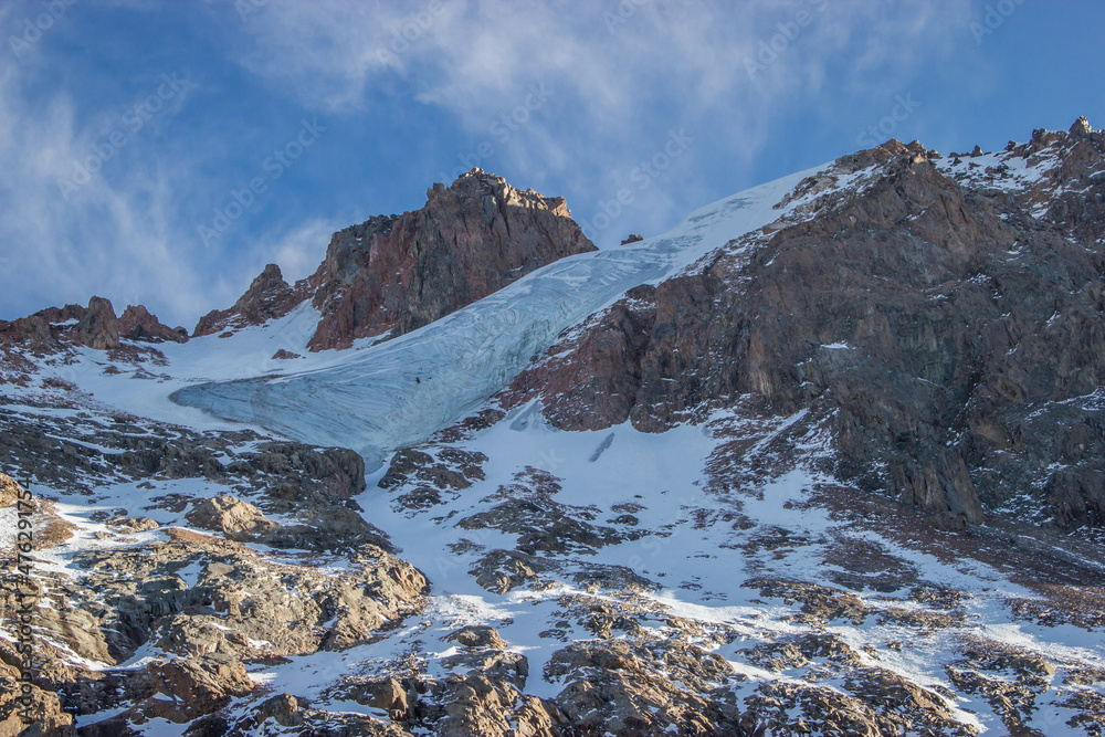 Obraz premium Huge blue glacier in the snowy mountains. Kazakhstan, near city of Almaty.