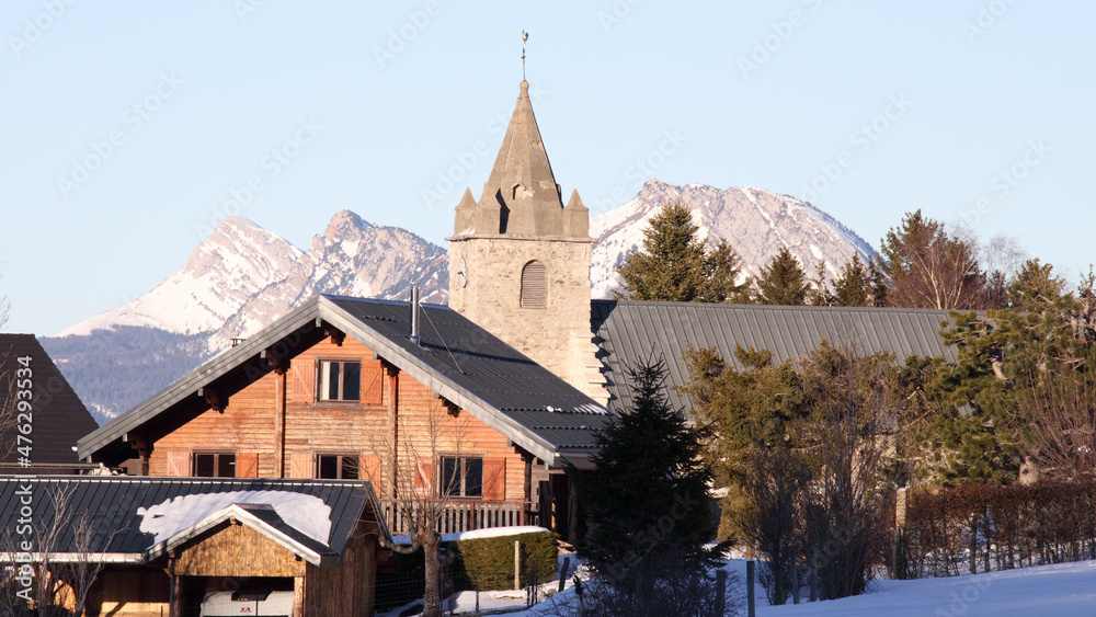 clocher de l'Eglise de St Nizier, bell tower church in the snowy mountains