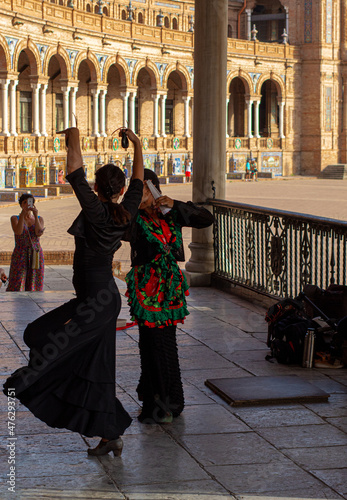 Women dancing a traditional Spanish dance in the Plaza de Espaa photo