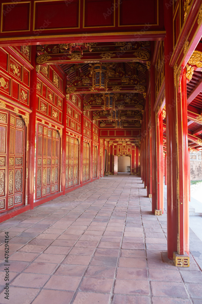 Fototapeta premium Beautiful red and golden archade. Imperial palace at Hue, Vietnam