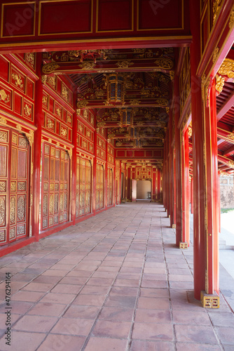 Beautiful red and golden archade. Imperial palace at Hue, Vietnam