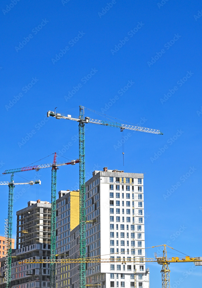 Crane and highrise construction site