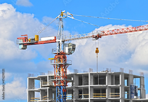 Crane and highrise construction site