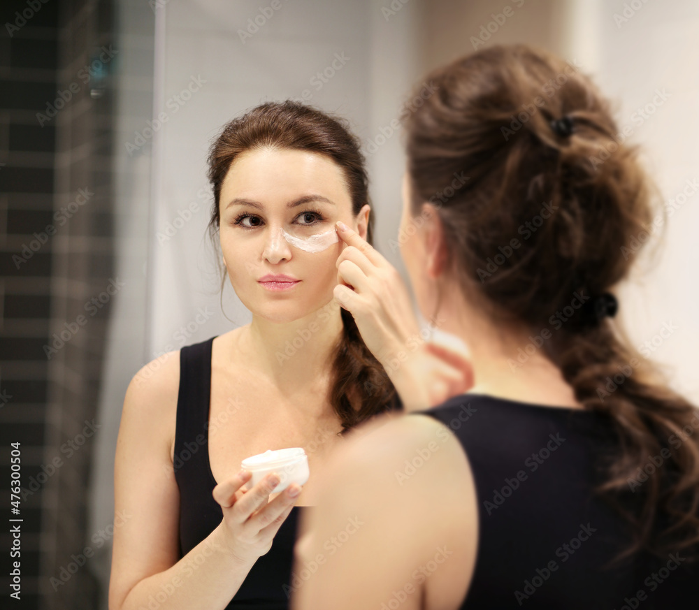 Applying the cream..Magic anti-aging cream. Applying the cream..Magic anti-aging cream.