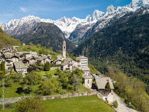Aerial image of the Swiss mountain village Solio with the snow-capped Sciora range at the background. Soglio was creadited as one the most beautiful village in Switzerland. photo