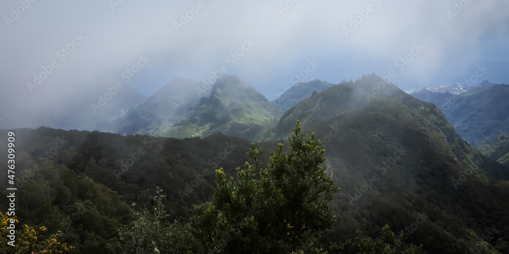 A scenic panorama of misty Anaga Mountains in the northern Tenerife, Canary Islands, Spain. 