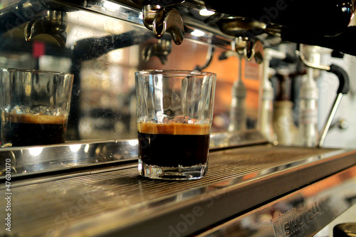 espresso machine pouring espresso