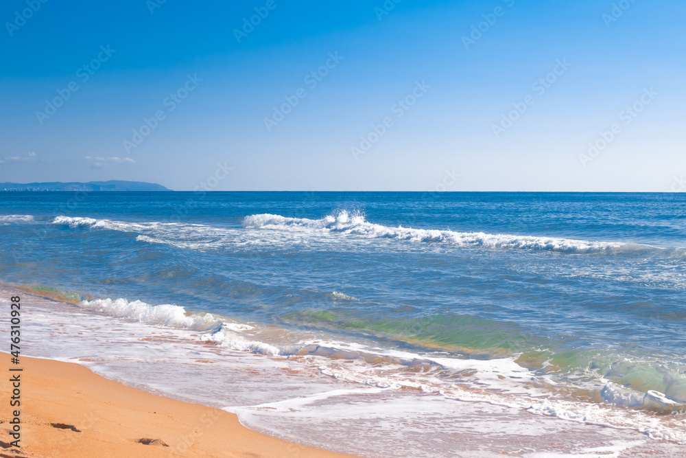 Beautiful blue sea with a wave on a summer day. Natural background of nature, seascape
