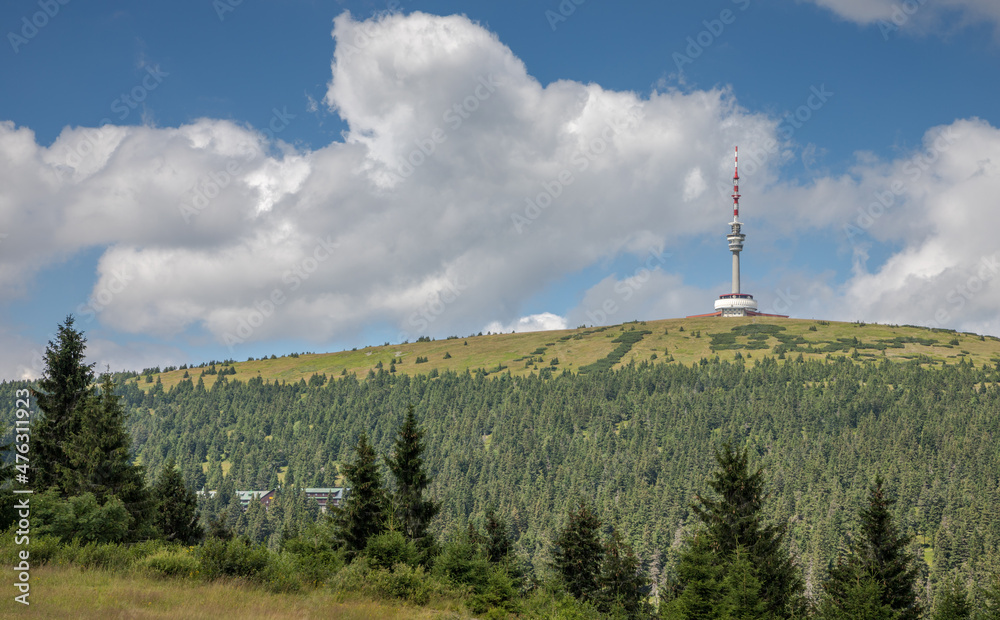 television transmitter with a lookout tower on a mountain ridge
