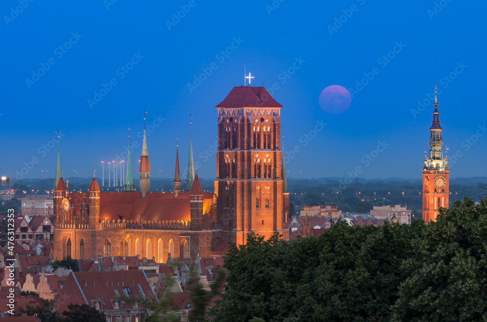 Gdansk, Poland, night view of the historical city center with St Mary's church