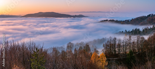 Fototapeta Naklejka Na Ścianę i Meble -  Misty autumn mountains landscape in the morning, Poland, Beskidy mountains and Tatra mountains in the background
