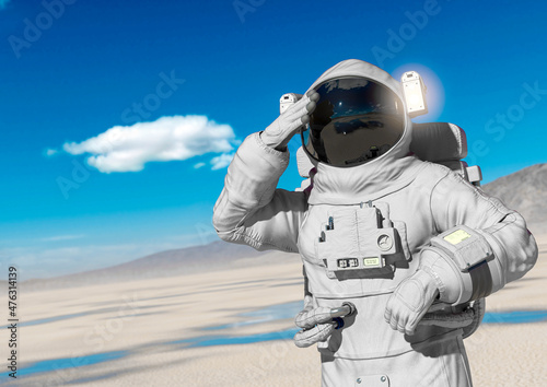 astronaut is thinking about in the desert of another planet after rain