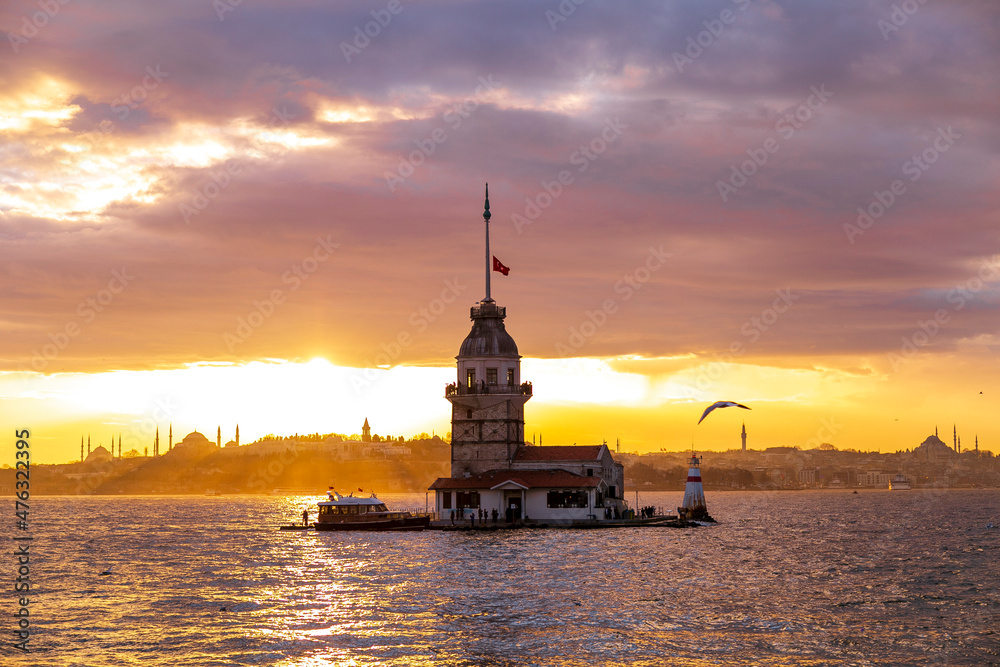 Maidens Tower at sunset, İstanbul. Beautiful clouds with blue sky. Historical light house of İstanbul Maidens Tower at sunset, İstanbul. Beautiful clouds with blue sky. Historical light house of İstanbul