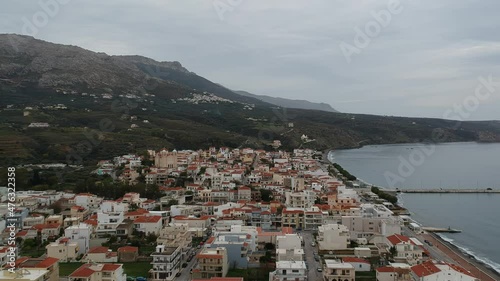 Aerial cityscape view of Neapolis town at sunset. Also named Vatika in Laconia, Greece. Neapoli is a famous coastal town built on the same site as the ancient Laconian city of Boeae photo