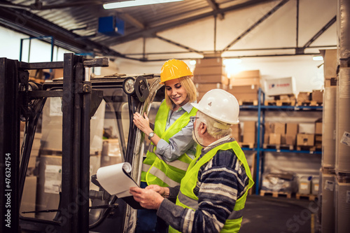 Group of workers working in a warehouse.