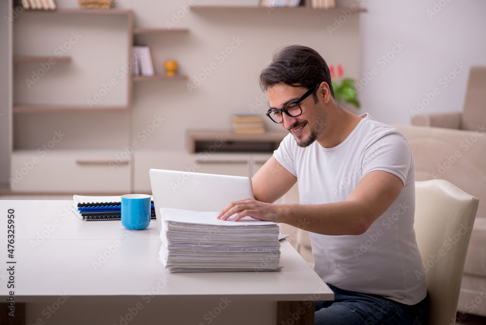 Young male freelancer working from home Young male freelancer working from home
