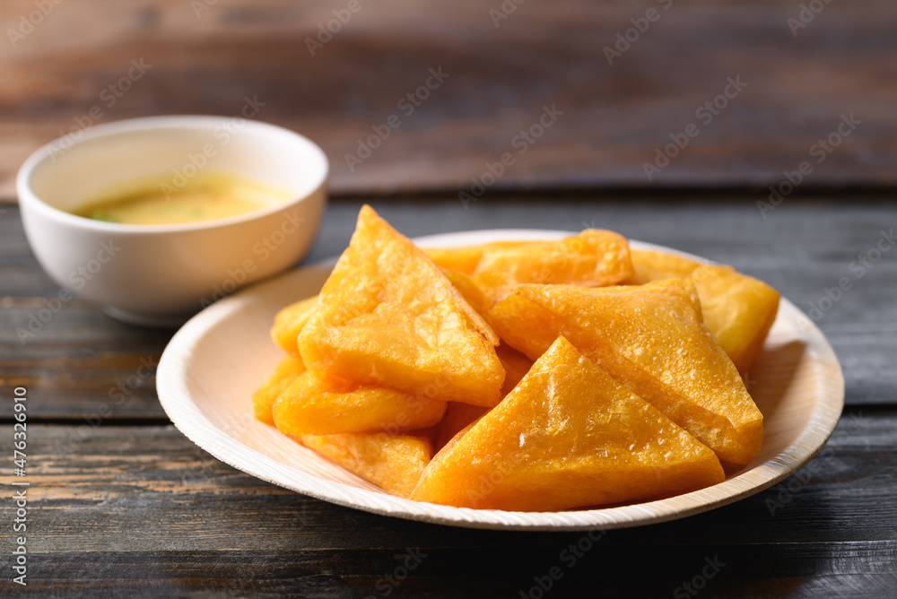 Deep fried Burmese tofu eating with spicy dipping sauce, Tai Yai food in Northern of Thailand Deep fried Burmese tofu eating with spicy dipping sauce, Tai Yai food in Northern of Thailand