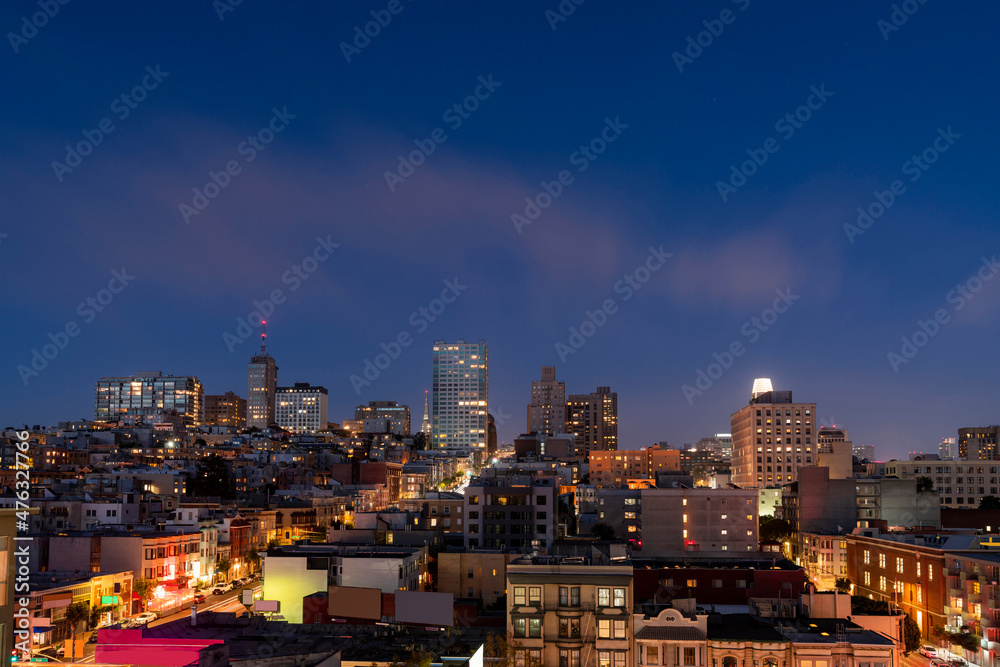 Panoramic cityscape view of San Francisco Nob hill area, which is historically known as center of San Francisco upper class residential neighborhoods at night time, midtown, California, United States