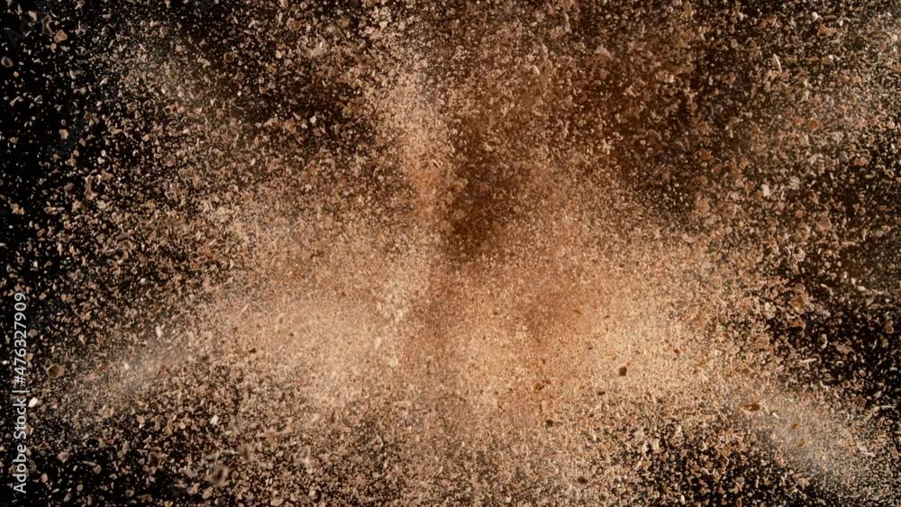 Super Slow Motion Shot of Brown Makeup Powder Explosion Isolated on Black at 1000 fps. Super Slow Motion Shot of Brown Makeup Powder Explosion Isolated on Black at 1000 fps.