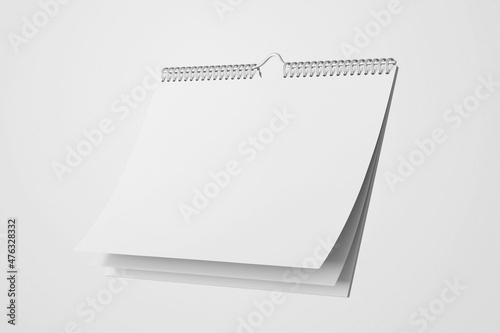 floating empty clean horizontal portrait wall spiral rings wire bound binding paper page 8.5 x 11 inches calendar realistic mockup right view clay 3d rendering 3d illustration photo