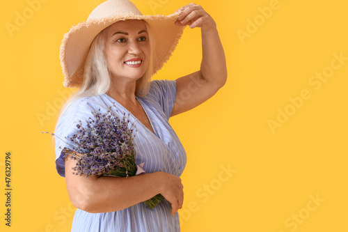 Elegant woman in straw hat ...