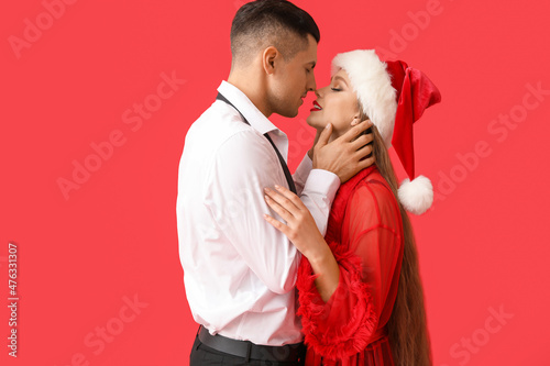 Sexy young couple on color ...