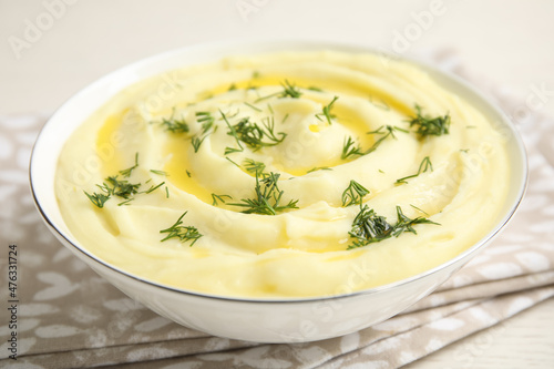 Freshly cooked homemade mashed potatoes on white table, closeup