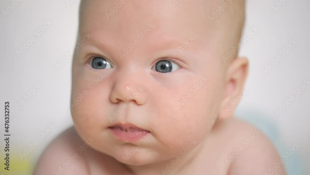 Mouth with saliva of a newborn baby, teeth grow Mouth with saliva of a newborn baby, teeth grow