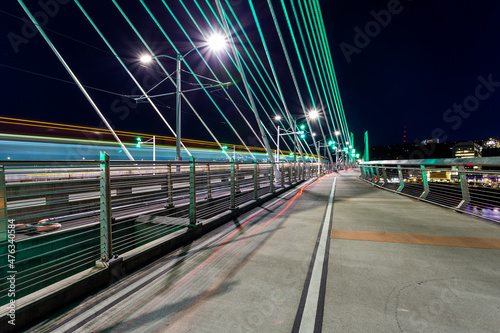 Transportation movement at the Tilikum Crossing bridge at dusk in Portland, Oregon photo