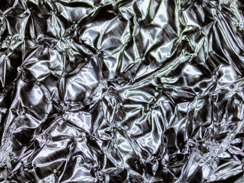 Detail of crushed aluminum foil. Photography made with a digital microscope. Detail of crushed aluminum foil. Photography made with a digital microscope.