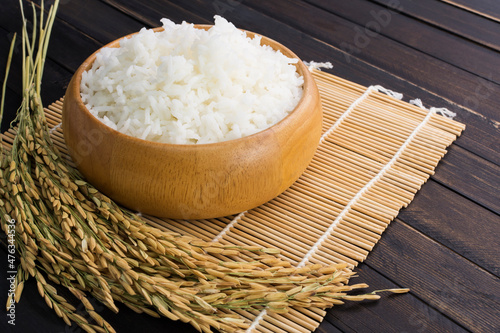 Close-up of white rice or jasmine rice in a wooden bowl photo