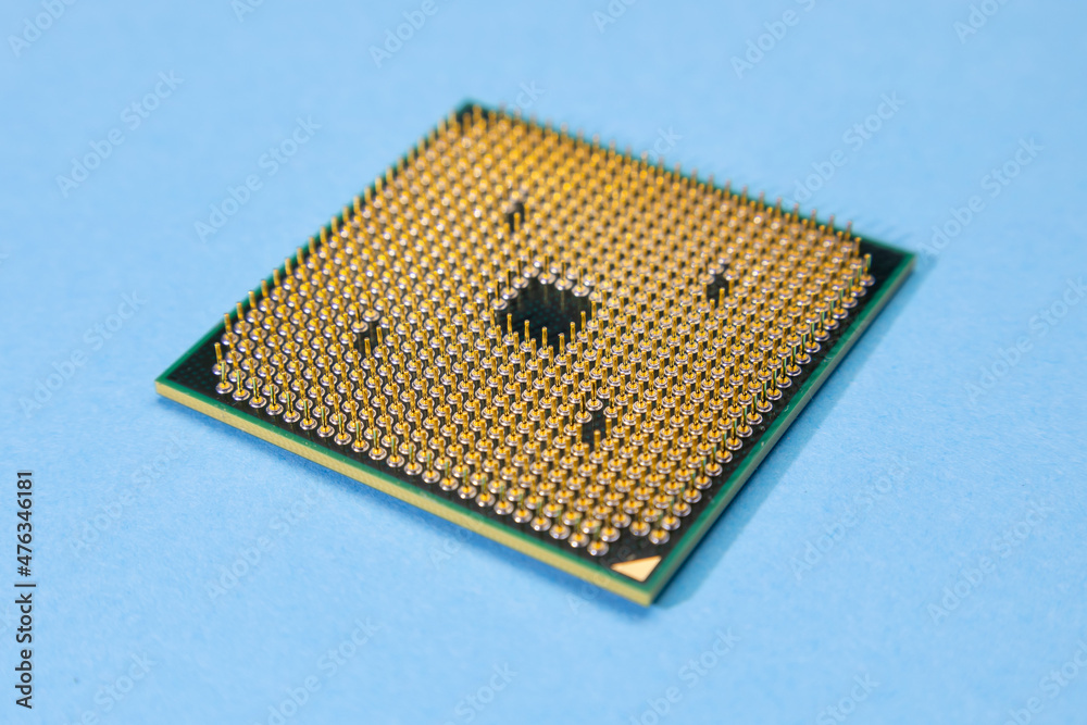 Processor from a computer on a blue background. computer repair Processor from a computer on a blue background. computer repair