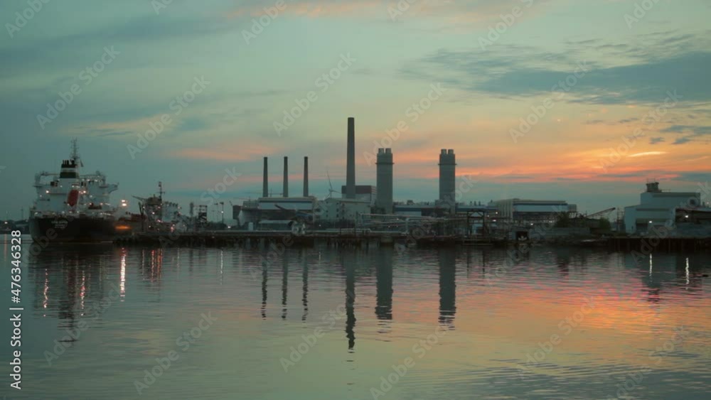 power plant and barge on mystic river boston sunset power plant and barge on mystic river boston sunset