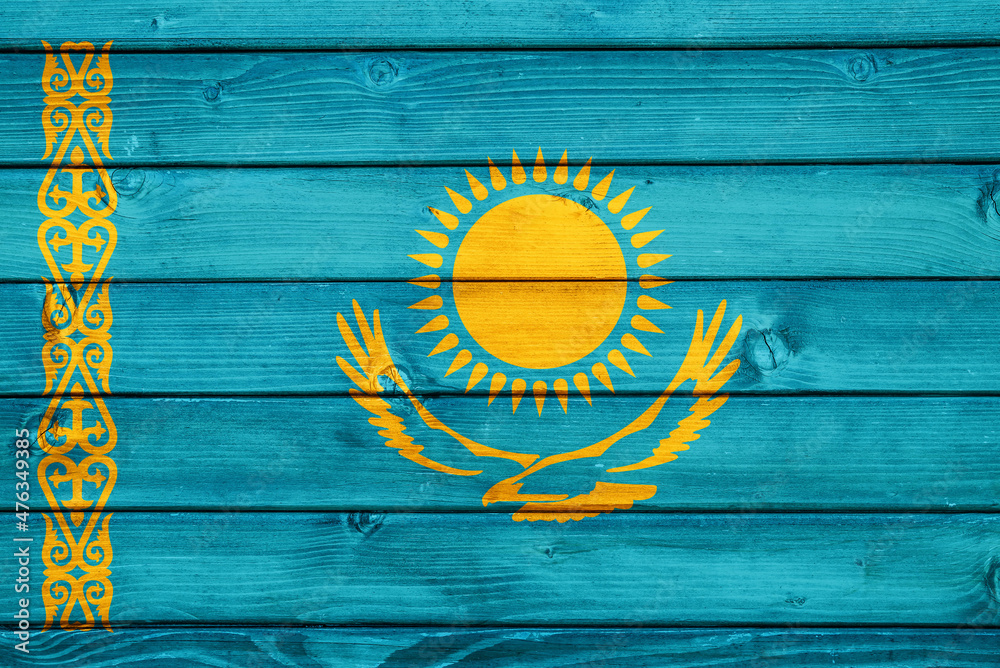Flag of Kazakhstan on wooden surface 