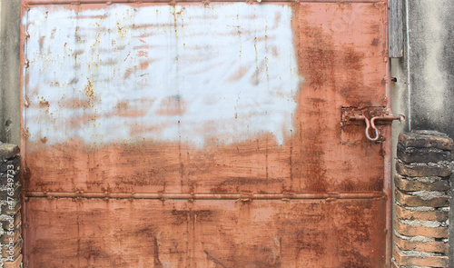 Old door grunge textured with rusty lock © studio2013