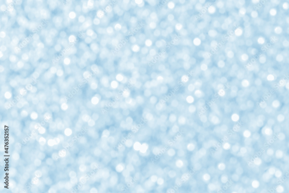 Abstract blue and white bokeh background. Christmas, New Year and all celebrations backgrounds concept. Snowfall in the winter background. Abstract blue and white bokeh background. Christmas, New Year and all celebrations backgrounds concept. Snowfall in the winter background.
