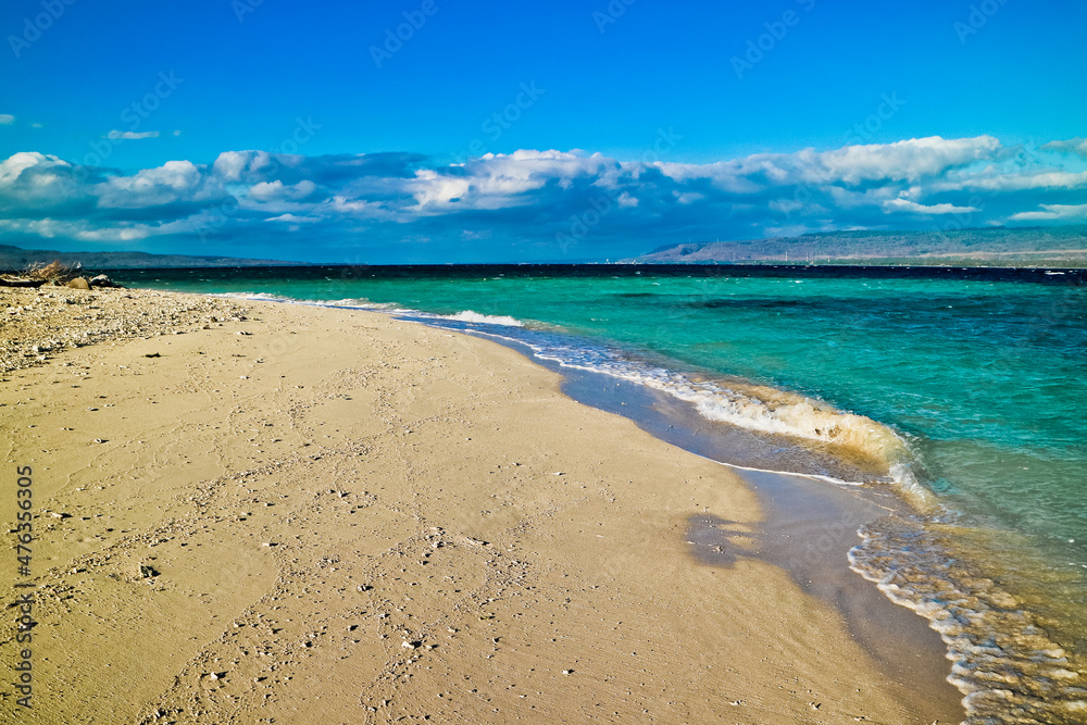 Obraz premium Scenic View Of Tropical paradise beach, Tabuhan Island, Banyuwangi, East Java