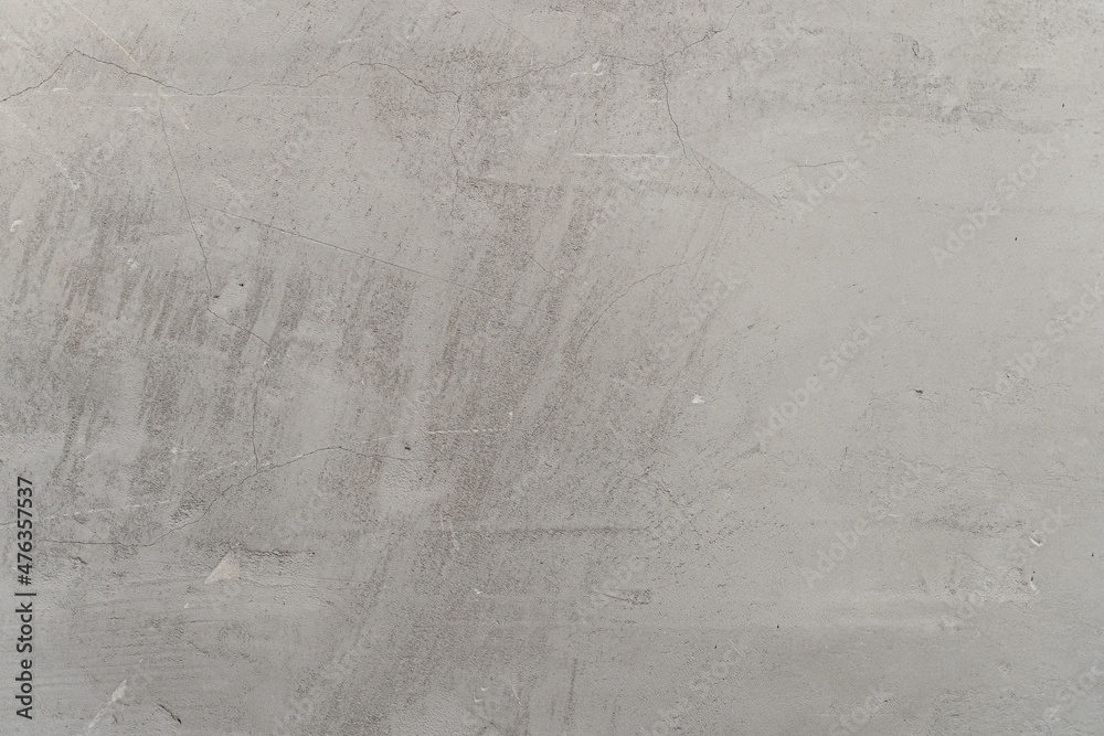 Cement concrete wall background. Gray stone texture and untreated wall surface before finishing.