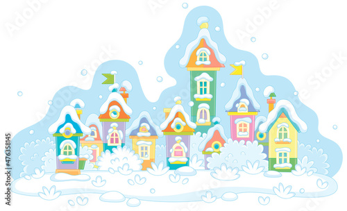 Colorful toy houses covered with snow on a cold and snowy winter day in a pretty small town, vector cartoon illustration isolated on a white background