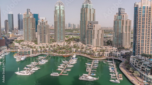 Luxury yacht bay in the city aerial timelapse in Dubai marina © neiezhmakov