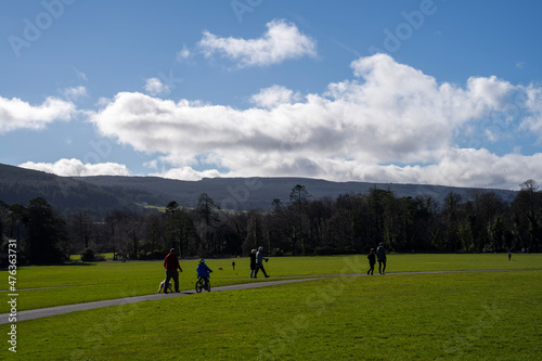 people walking on a hill